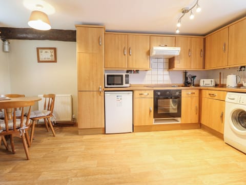 Fridge, electric kettle, toaster, cookware/dishes/utensils