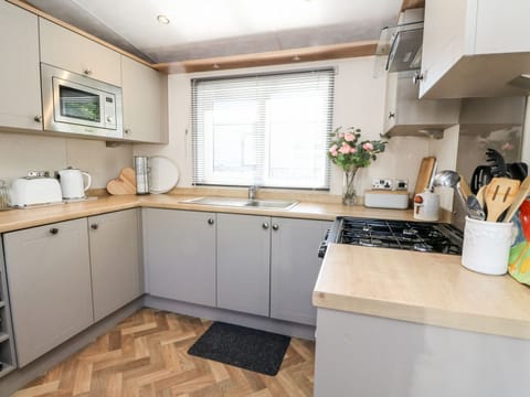 Fridge, electric kettle, toaster, cookware/dishes/utensils