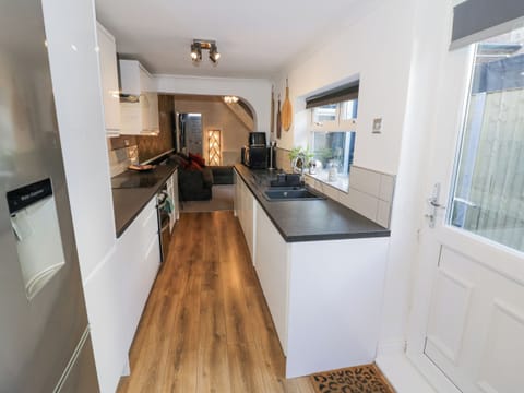 Fridge, electric kettle, toaster, cookware/dishes/utensils