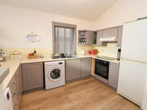 Fridge, electric kettle, toaster, cookware/dishes/utensils