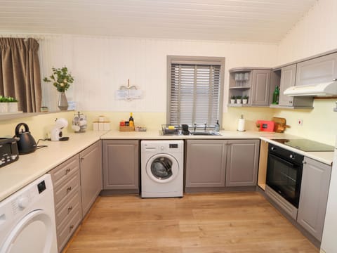 Fridge, electric kettle, toaster, cookware/dishes/utensils