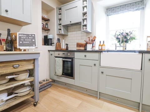 Fridge, electric kettle, cookware/dishes/utensils