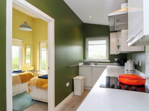 Fridge, electric kettle, toaster, cookware/dishes/utensils