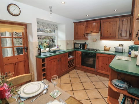 Fridge, electric kettle, toaster, cookware/dishes/utensils