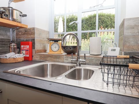 Fridge, electric kettle, toaster, cookware/dishes/utensils