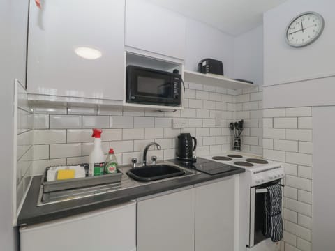 Fridge, electric kettle, toaster, cookware/dishes/utensils