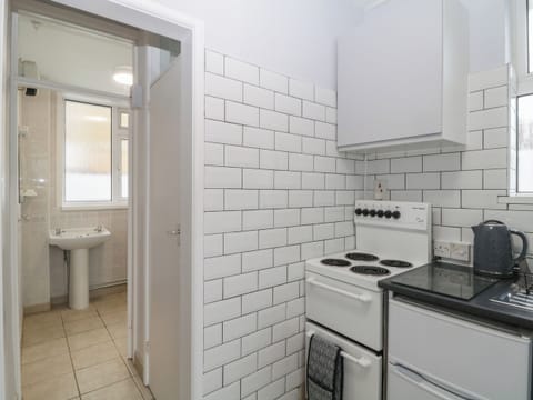 Fridge, electric kettle, toaster, cookware/dishes/utensils