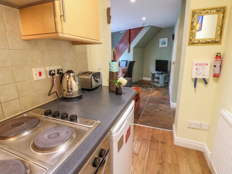 Fridge, electric kettle, toaster, cookware/dishes/utensils