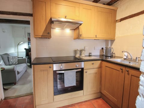 Fridge, electric kettle, cookware/dishes/utensils