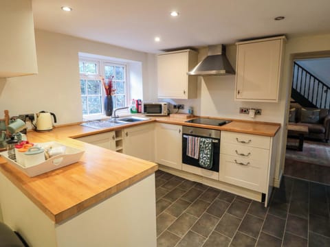 Fridge, electric kettle, toaster, cookware/dishes/utensils