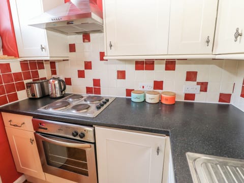 Fridge, electric kettle, toaster, cookware/dishes/utensils