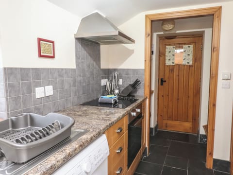 Fridge, electric kettle, cookware/dishes/utensils