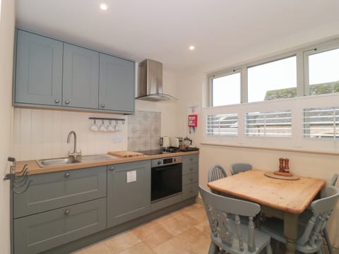 Fridge, electric kettle, toaster, cookware/dishes/utensils