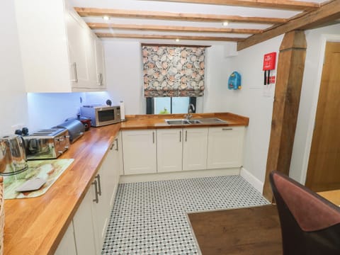 Fridge, dishwasher, toaster, cookware/dishes/utensils