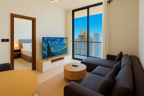 Natural light, smart TV, and direct balcony access.