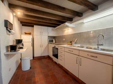 Kitchen, Flooring, Countertop, Floor, Interior Design, Wood, Ceiling, Kitchen Appliance, Major Appliance, Furniture