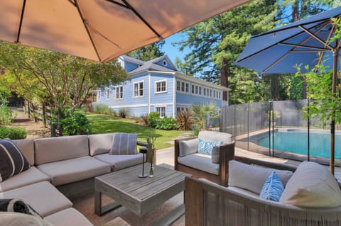Unwind by the pool at Sweetwater Ranch. This scenic seating area is the ideal place to kick back after a day of exploring nearby Healdsburg and the majestic Russian River redwoods.