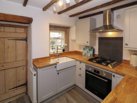 Fridge, electric kettle, toaster, cookware/dishes/utensils