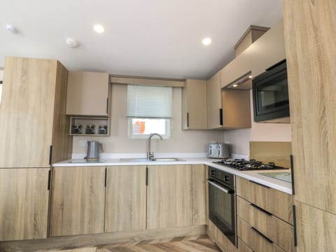 Fridge, electric kettle, toaster, cookware/dishes/utensils