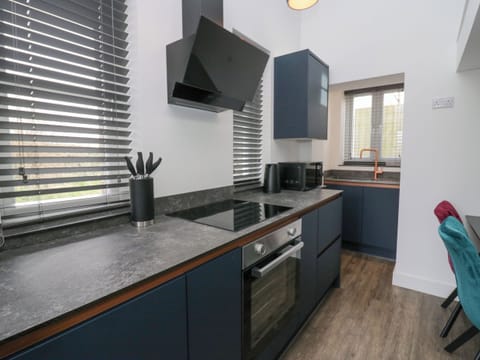 Fridge, electric kettle, toaster, cookware/dishes/utensils