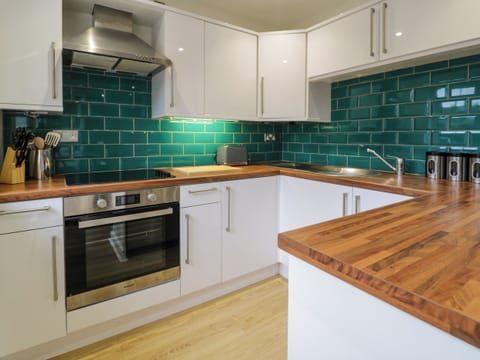 Fridge, electric kettle, toaster, cookware/dishes/utensils