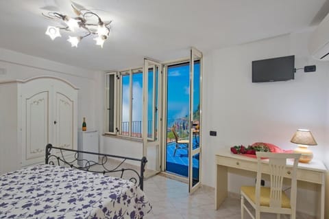 Deluxe Suite, Smoking, Sea View | 1 bedroom, iron/ironing board, free WiFi