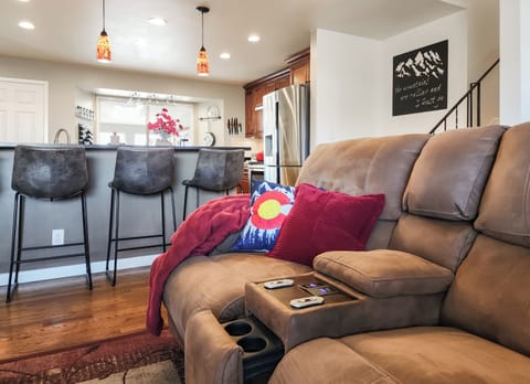 The reclining seats come with cup holders.