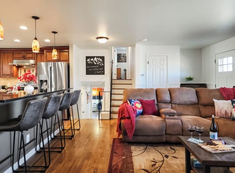 At the back you see access to the upstairs and downstairs bedrooms.