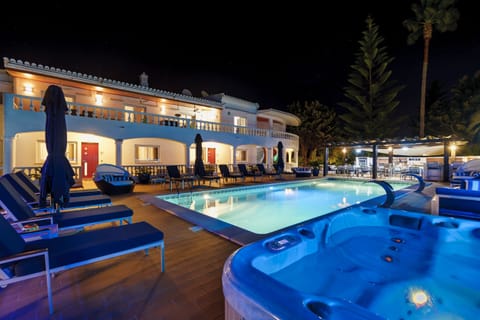 Illuminated pool area at night