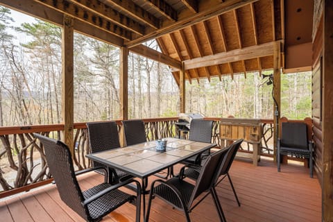 Outdoor dining area under covered deck.