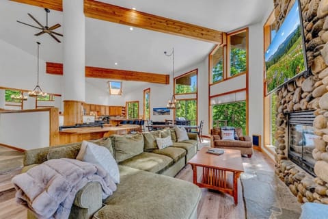 Living room 1: Main floor, Smart TV, pool table, sauna, bar area, upper deck access, central heat, no A/C (Fireplace is non-functional)