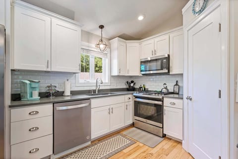 The open, airy kitchen offers ample space & all the comforts of home