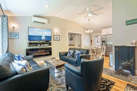 Curl up in the coastal living room & stream all your favorite entertainment