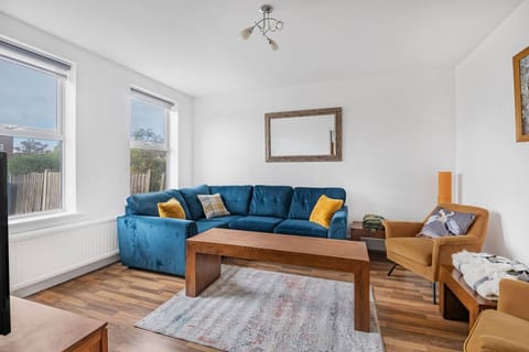 Additional lounge with sectional sofa and coffee table