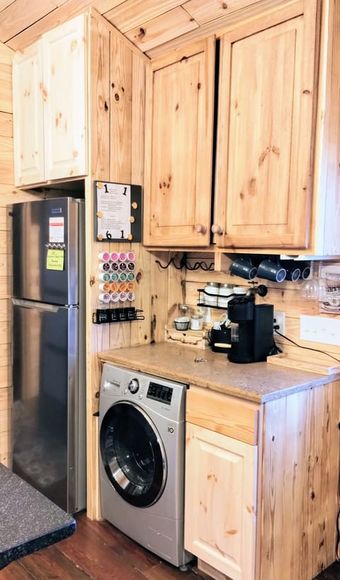 Small washer/dryer combo. Coffee bar w/ faucet, K cup coffee maker w/ fixin's