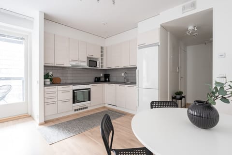 Apartment kitchen. There is a dishwasher, toaster, coffee maker, kettle etc. included.