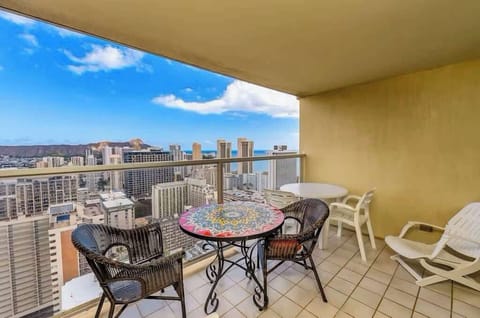 Bright, breezy balcony perfect for outdoor dining with a view