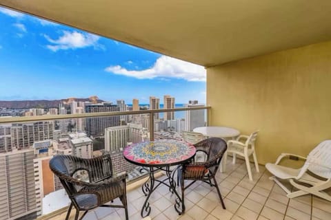 Bright, breezy balcony perfect for outdoor dining with a view