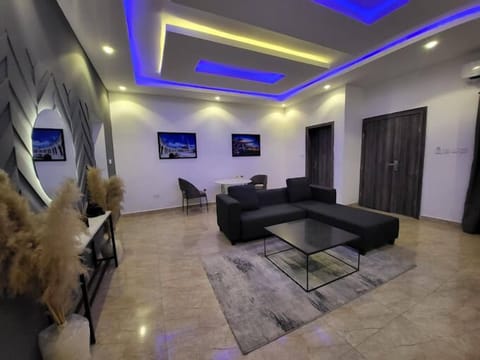Deluxe Room, Balcony, City View | Living area