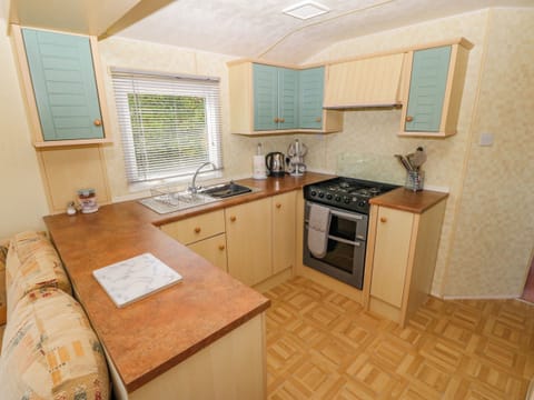 Fridge, electric kettle, toaster, cookware/dishes/utensils