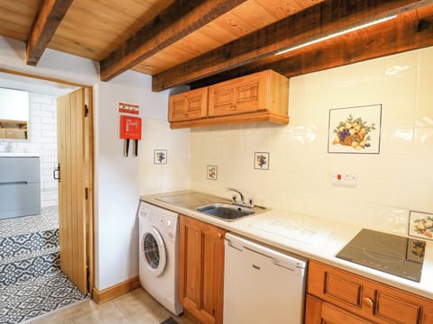 Fridge, electric kettle, toaster, cookware/dishes/utensils