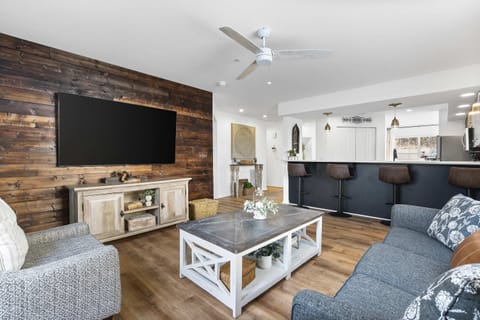 Curl up in the chic living room & stream your favorites on the smart TV