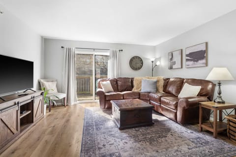 Curl up in the serene living room & stream your favorites on the smart TV