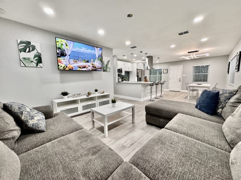 This spacious living room is thoughtfully designed to cater to your every need, whether you’re unwinding after a day of exploring Tampa, hosting a movie night, or simply enjoying quality time with loved ones.