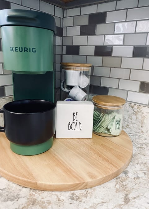 Coffee Bar Essentials – Keurig machine with pods for a fresh brew any time of day.