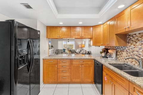 Kitchen Kitchen featuring wooden cabinetry and space for your meal prep