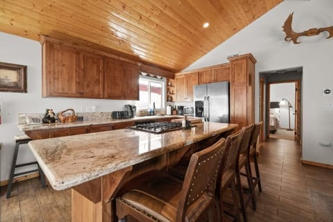 Create culinary masterpieces in our charming kitchen, where rustic elegance meets modern convenience.