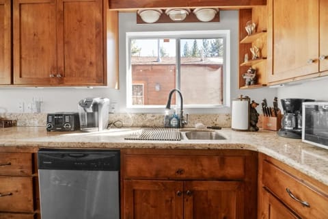 Create culinary masterpieces in our charming kitchen, where rustic elegance meets modern convenience.