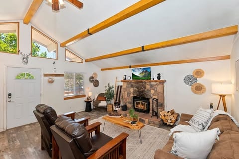 Cozy up in a warm and inviting living room, where rustic charm meets modern comfort.