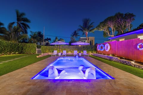 As the sun dips low, the pool glows —perfect for moonlit dips, intimate conversations, and unforgettable nights in Delray Beach.